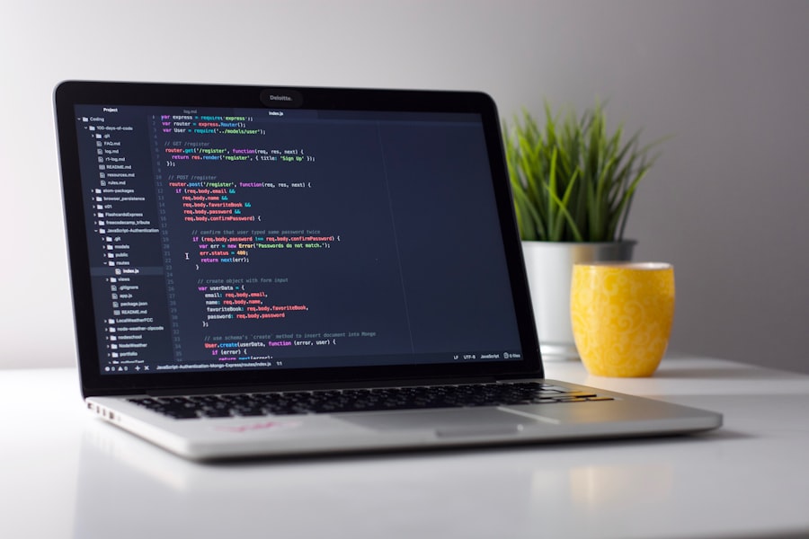 Software developer writing code on a computer screen